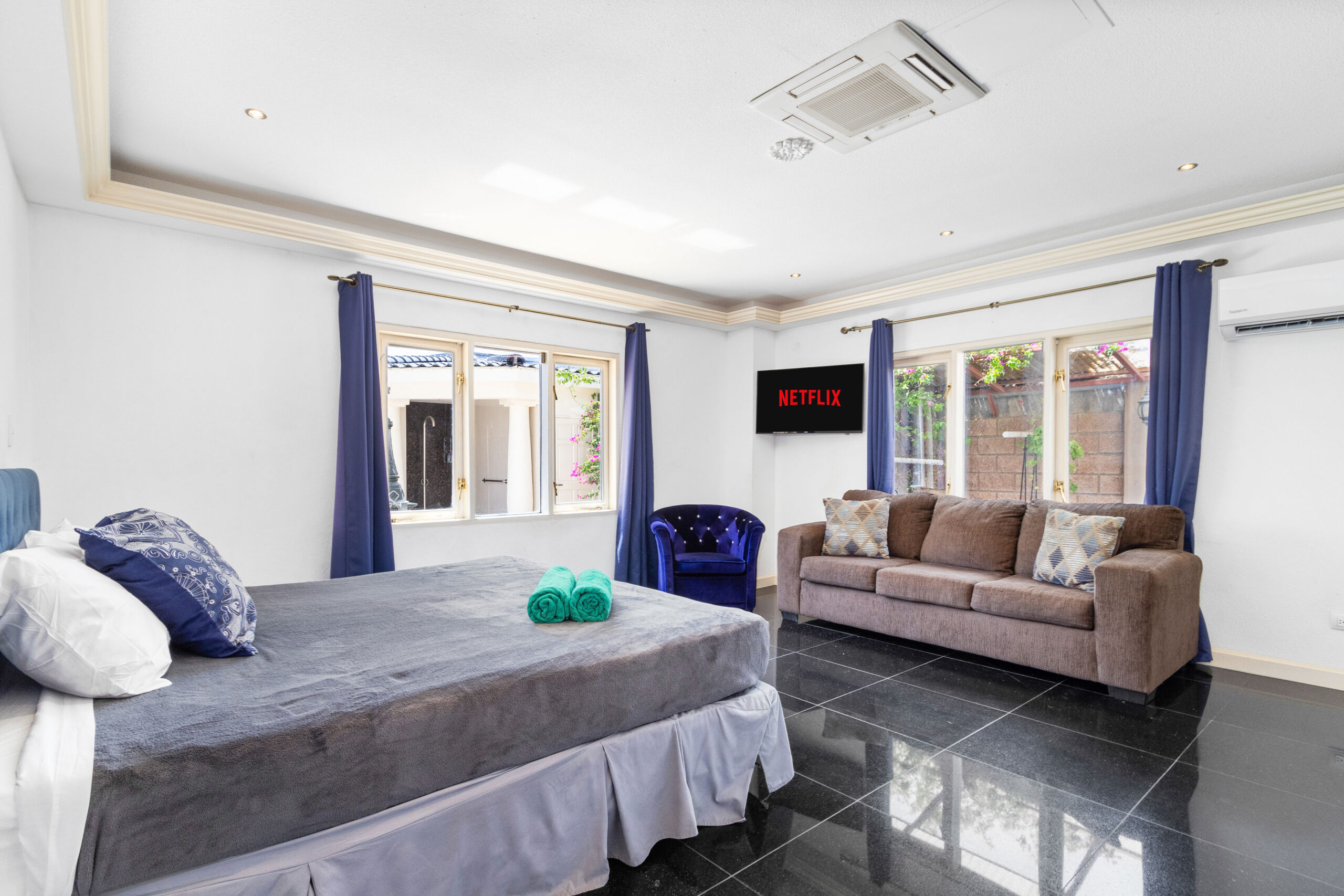 Luxurious bedroom at La Casa Piu Bella, Aruba's premier estate.